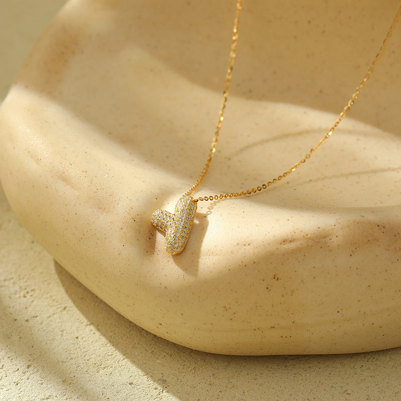 Collier initiale diamants