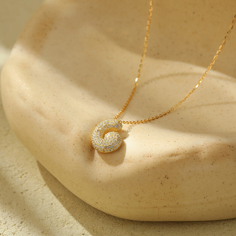 Collier initiale diamants