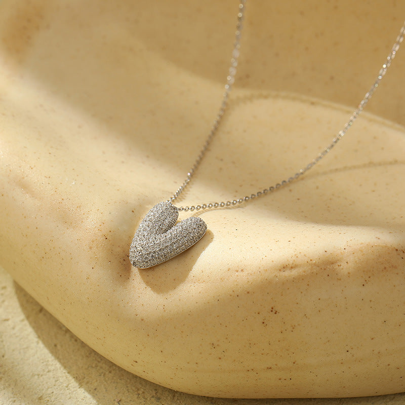 Collier initiale diamants