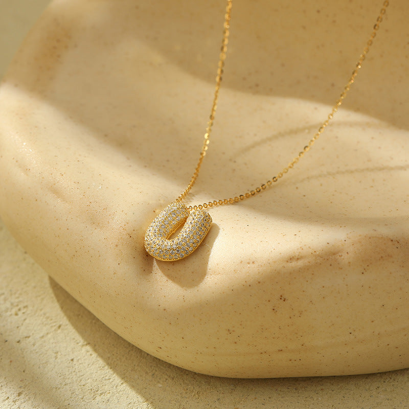 Collier initiale diamants