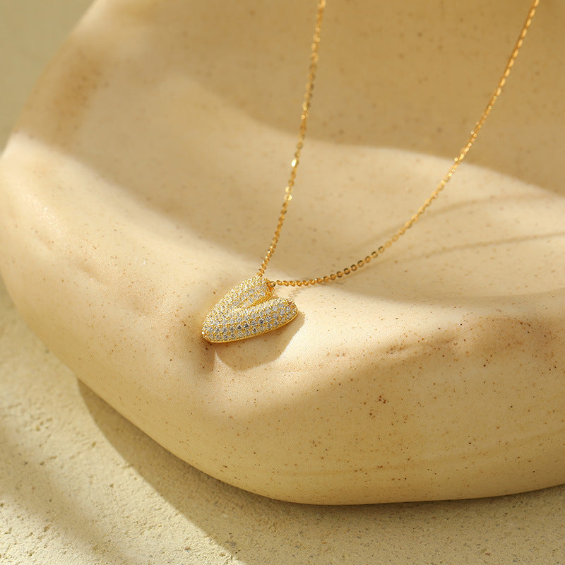 Collier initiale diamants