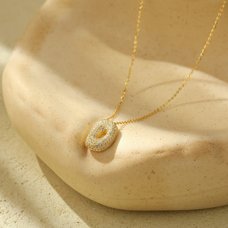 Collier initiale diamants