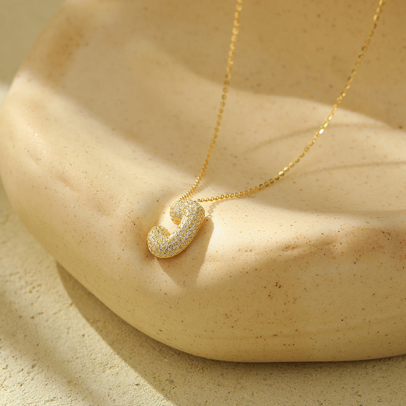 Collier initiale diamants