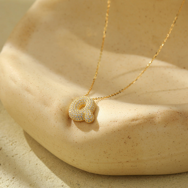 Collier initiale diamants