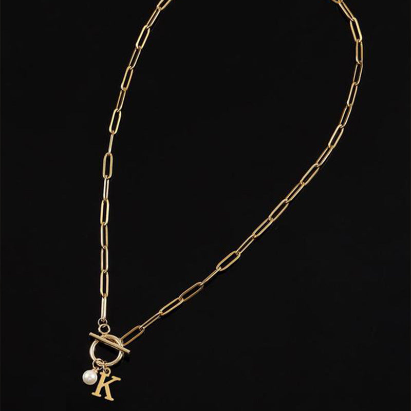 Collier lettre anneau