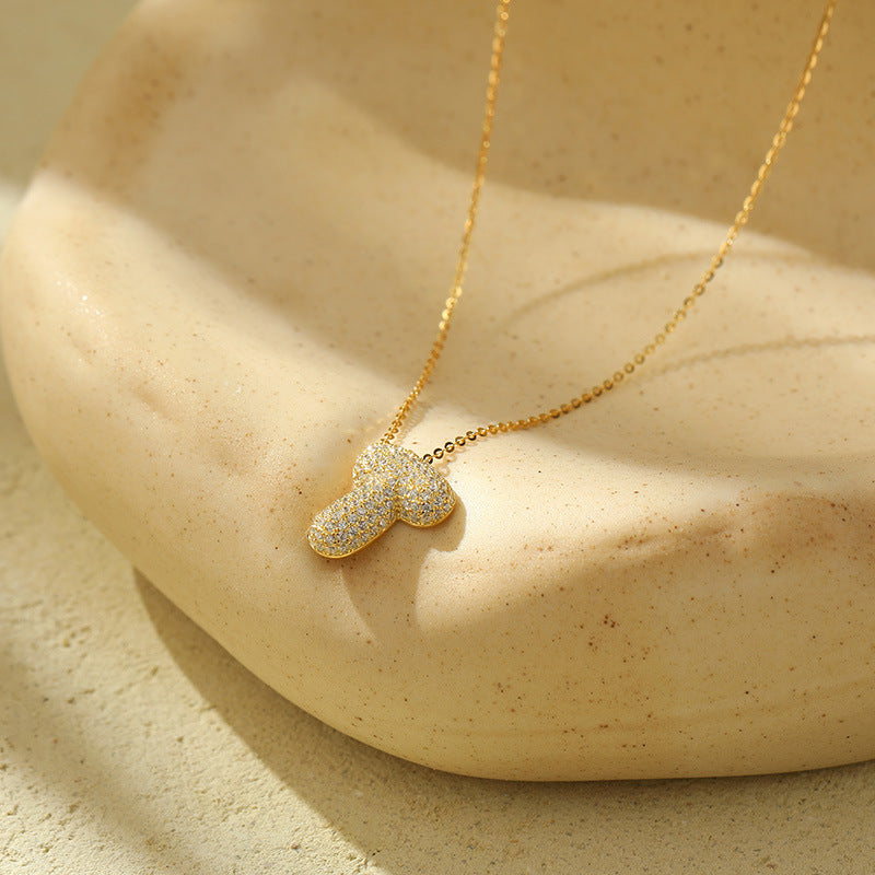 Collier initiale diamants