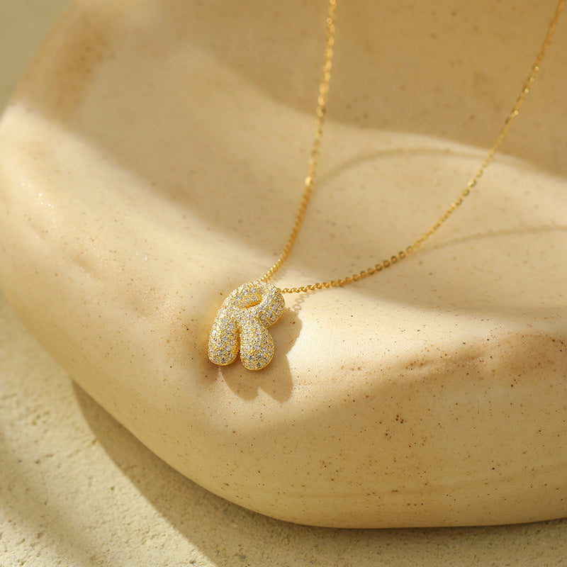 Collier initiale diamants