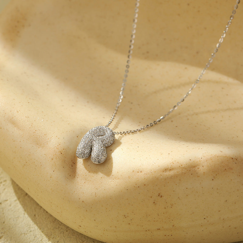 Collier initiale diamants