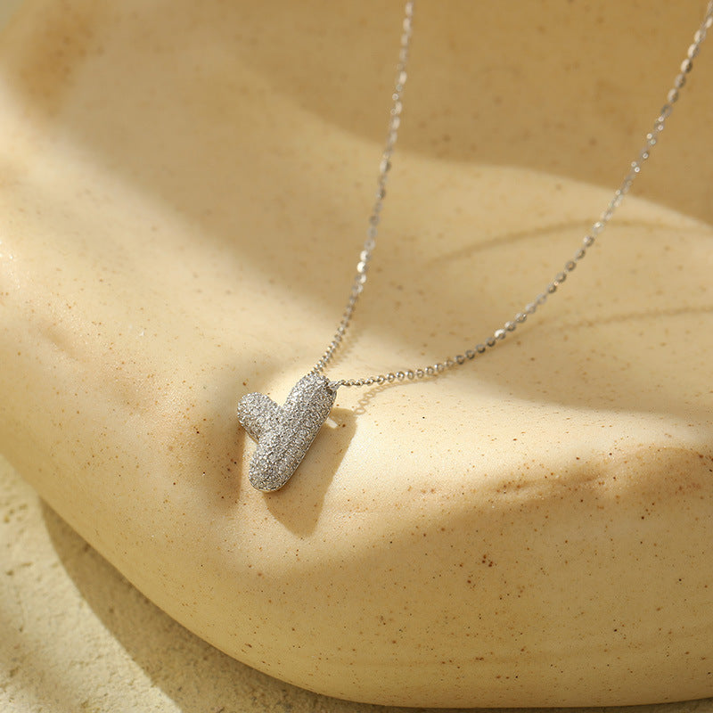 Collier initiale diamants